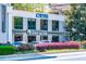 Well-maintained building featuring Pure Dental Health and Another Broken Egg Cafe, with professional landscaping at 2285 Peachtree Ne Rd # 604, Atlanta, GA 30309