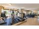 Well-equipped fitness center with treadmills, elliptical, and free weights in a naturally lit space at 2285 Peachtree Ne Rd # 604, Atlanta, GA 30309