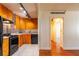 Spacious kitchen featuring black appliances, wooden cabinets, and light-colored tile flooring at 2285 Peachtree Ne Rd # 604, Atlanta, GA 30309