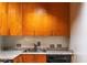 Kitchen features light-colored countertops, wooden cabinets, and a stainless steel sink at 2285 Peachtree Ne Rd # 604, Atlanta, GA 30309