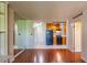 Hardwood living room floors with view to kitchen at 2285 Peachtree Ne Rd # 604, Atlanta, GA 30309