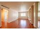 Bright living room featuring hardwood floors and built-in shelving at 2285 Peachtree Ne Rd # 604, Atlanta, GA 30309