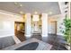 Building lobby area with neutral walls, tiled floors, and an ornamental house plant at 2285 Peachtree Ne Rd # 604, Atlanta, GA 30309