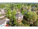 An aerial view of the home surrounded by lush greenery and a well-maintained neighborhood at 482 Cooper Lake Se Rd, Smyrna, GA 30126