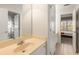 Bathroom with tile flooring and single vanity, adjacent to bedroom at 482 Cooper Lake Se Rd, Smyrna, GA 30126