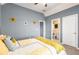 Bedroom with neutral decor, a doorway to an ensuite bathroom, and carpeted floors at 482 Cooper Lake Se Rd, Smyrna, GA 30126
