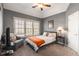 Bedroom with carpet flooring, neutral paint, and large window at 482 Cooper Lake Se Rd, Smyrna, GA 30126