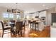 Kitchen features stainless steel appliances, white cabinets, and eat-in area with access to deck at 482 Cooper Lake Se Rd, Smyrna, GA 30126