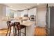 Well-lit kitchen featuring a center island, stainless steel appliances, and ample counter space at 482 Cooper Lake Se Rd, Smyrna, GA 30126