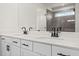 Bathroom featuring double sink vanity, modern fixtures, and granite countertop at 1016 Rose Dr, Marietta, GA 30060