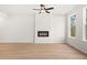 Spacious living room with an electric fireplace and natural light at 1016 Rose Dr, Marietta, GA 30060
