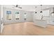 Open living and kitchen area with light wood floors and large windows at 1016 Rose Dr, Marietta, GA 30060