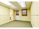 Finished basement area, offering a versatile space with paneled walls at 1039 Smyrna Rd Sw, Conyers, GA 30094