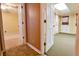 Open basement with doorway leading to bedroom on one side and bathroom on the other at 1039 Smyrna Rd Sw, Conyers, GA 30094