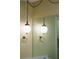 Bathroom featuring vintage light fixture with pendant lights and towel rack at 1039 Smyrna Rd Sw, Conyers, GA 30094