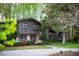Lovely two-story home with a brick facade, mature trees and charming curb appeal at 1039 Smyrna Rd Sw, Conyers, GA 30094