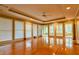 Spacious living room with hardwood floors, recessed lighting, and multiple windows offering ample natural light at 1039 Smyrna Rd Sw, Conyers, GA 30094