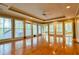 Bright living room with hardwood floors, recessed lighting, large windows, and a ceiling fan at 1039 Smyrna Rd Sw, Conyers, GA 30094