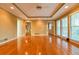 Open living room featuring hardwood floors, a ceiling fan, and lots of natural light at 1039 Smyrna Rd Sw, Conyers, GA 30094