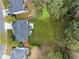 Expansive backyard with a well-maintained lawn and a cozy patio area with outdoor seating at 13070 Tidewater Xing, Alpharetta, GA 30005
