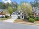 Beautiful two-story home with a two-car garage, lush landscaping, and charming curb appeal at 13070 Tidewater Xing, Alpharetta, GA 30005
