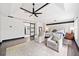 Spacious main bedroom with wood floors, a sitting area, and en suite at 13070 Tidewater Xing, Alpharetta, GA 30005