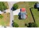 Aerial perspective displaying home, parking area, and expansive, well-maintained green surroundings at 195 Woodbridge Dr, Dallas, GA 30157