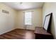 Comfortable bedroom with wood floors, natural light, and ample space at 195 Woodbridge Dr, Dallas, GA 30157