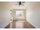 Inviting dining room features hardwood floors and a large window providing plenty of natural light at 195 Woodbridge Dr, Dallas, GA 30157