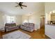 Spacious living room featuring hardwood floors, neutral paint, vaulted ceilings, and modern furniture at 195 Woodbridge Dr, Dallas, GA 30157