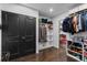 Spacious walk-in closet with dark doors and custom storage solutions at 2123 Juanita St, Decatur, GA 30032