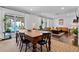 Open floor plan showcases a dining room with an outdoor view connecting the space to the comfortable living room at 2123 Juanita St, Decatur, GA 30032