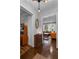 Sun-drenched foyer with hardwood flooring and views into other rooms of the home at 2123 Juanita St, Decatur, GA 30032