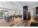 Open concept living seamlessly blends the dining area with an inviting living room and a modern kitchen at 2123 Juanita St, Decatur, GA 30032