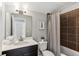 Bathroom featuring modern vanity, shower, and toilet at 26 Hardpan Aly, Marietta, GA 30066