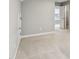 Carpeted room with two doors that lead to other rooms at 26 Hardpan Aly, Marietta, GA 30066