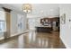 Open-concept kitchen features stainless steel appliances, granite countertops, and a large island for entertaining at 26 Hardpan Aly, Marietta, GA 30066