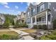 Neighborhood street view featuring homes with landscaped front yards at 26 Hardpan Aly, Marietta, GA 30066