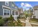 Neighborhood street view featuring homes with landscaped front yards at 26 Hardpan Aly, Marietta, GA 30066
