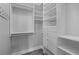 Custom closet featuring built-in shelving, drawers, and ample storage for organization and convenience at 1029 Piedmont Ne Ave # 102, Atlanta, GA 30309
