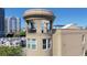 Building exterior featuring a rooftop balcony with views of the skyline at 1029 Piedmont Ne Ave # 102, Atlanta, GA 30309