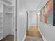 Hallway with hardwood floors and a large artwork for modern style at 1029 Piedmont Ne Ave # 102, Atlanta, GA 30309