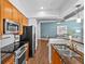 Modern kitchen features stainless steel appliances, granite countertops, and ample cabinet space at 1029 Piedmont Ne Ave # 102, Atlanta, GA 30309