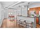 An open concept kitchen features breakfast bar seating and modern appliances at 1029 Piedmont Ne Ave # 102, Atlanta, GA 30309