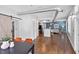 An open-concept living area boasts hardwood floors and modern architectural details at 1029 Piedmont Ne Ave # 102, Atlanta, GA 30309