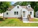 Attractive home featuring newly painted siding, tidy landscaping and inviting front entrance at 1282 Eastridge Sw Rd, Atlanta, GA 30311