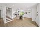 Bright, modern kitchen with center island, stainless appliances and hardwood floors at 1282 Eastridge Sw Rd, Atlanta, GA 30311