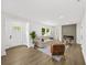 Stylish living room with updated flooring, a modern fireplace, and lots of natural light at 1282 Eastridge Sw Rd, Atlanta, GA 30311