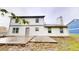 Backyard featuring concrete patio and grassy area at 2740 Ashley Downs Ln, Atlanta, GA 30349