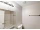 Neutral bathroom with a granite countertop, chrome towel bar, and full mirror at 2740 Ashley Downs Ln, Atlanta, GA 30349